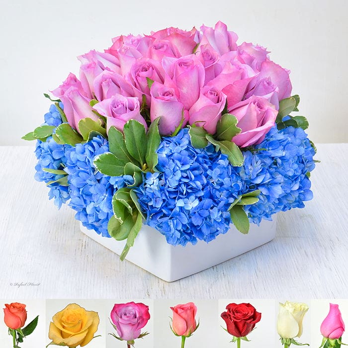A beautiful contemporary floral centerpiece, with roses