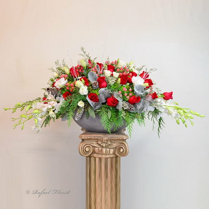 Christmas centerpiece in concrete container - Best Florist in Marin County