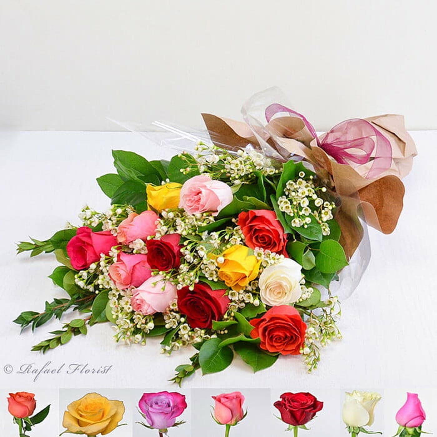 classic wrapped bouquet of roses with lush greenery